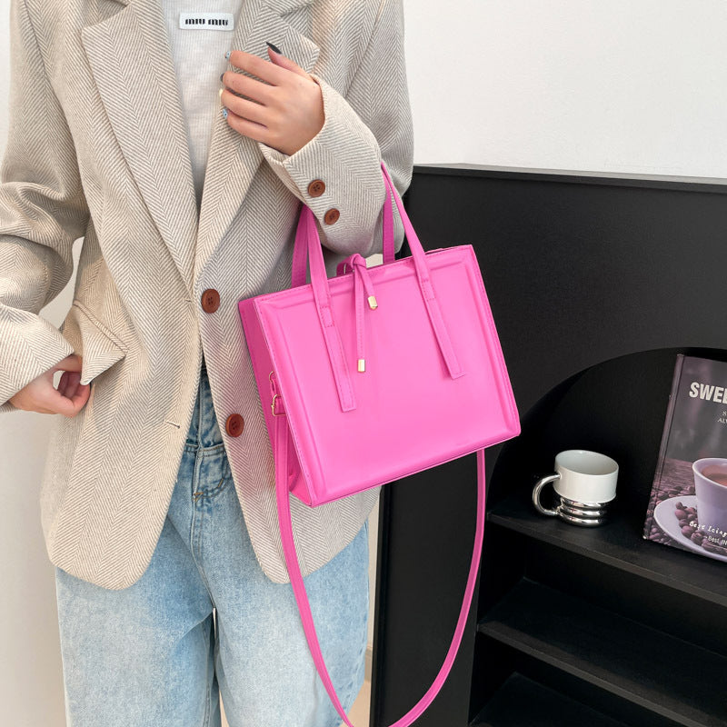 Women's elegant handbag in minimalist design with detachable shoulder strap