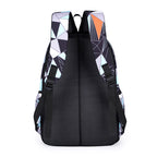 School backpack with multiple compartments and matching accessories