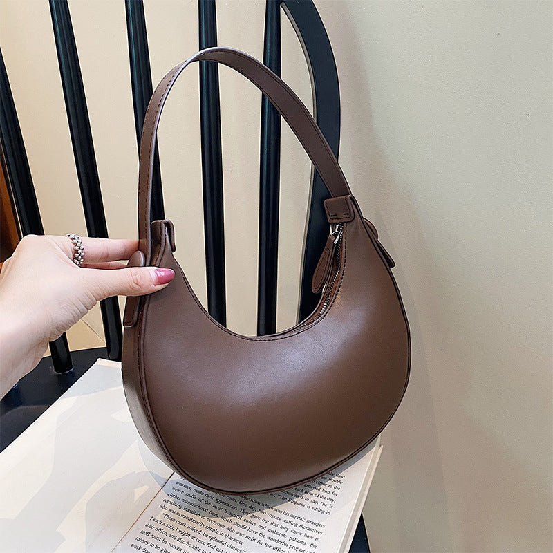 Women elegant shoulder bag with modern accents