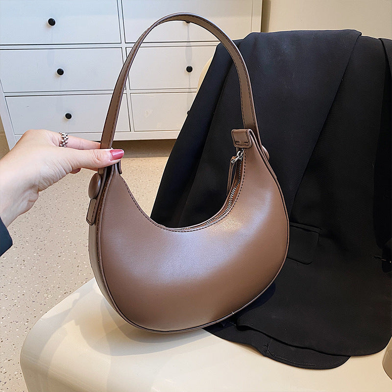 Women elegant shoulder bag with modern accents