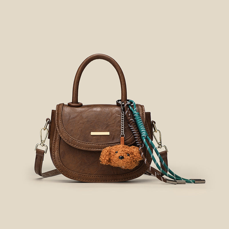 Women's mini handbag with playful detail and high-quality faux leather