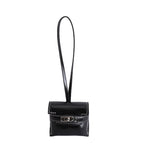 Ladies mini handbag made of high-quality artificial leather with playful closure