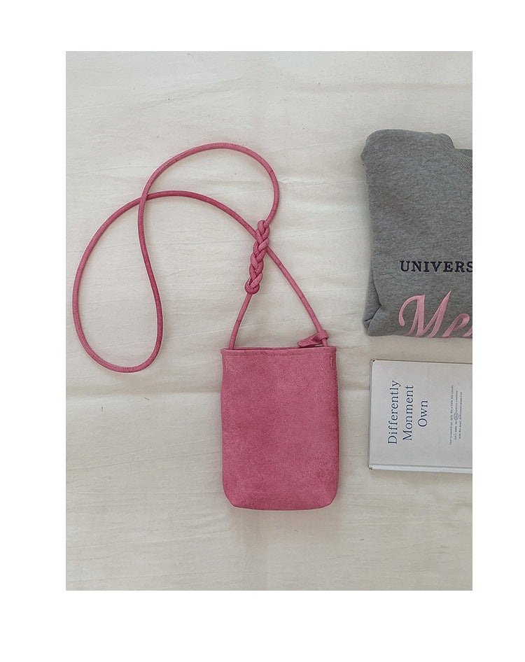 Fashionable shoulder bag with braided shoulder strap