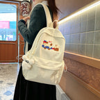 Playful Embroidered Backpack