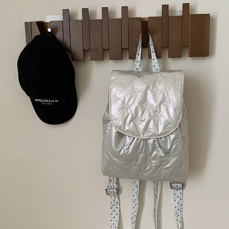 Backpack with velvet-soft upper material and elegant flap closure