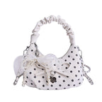 Women's mini handbag with decorative accents