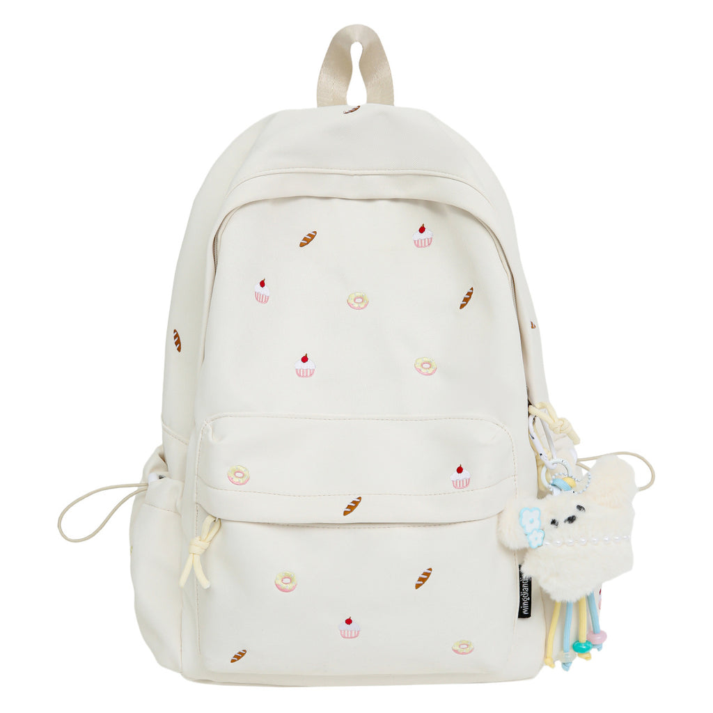 Playful backpack with unique back pattern appliqués
