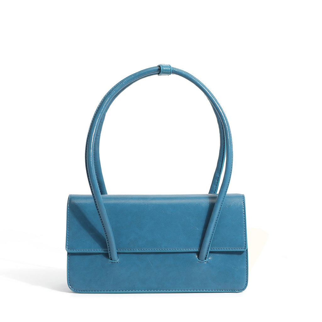 Ladies elegant handbag with minimalist silhouette