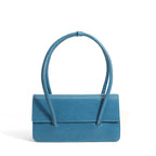 Ladies elegant handbag with minimalist silhouette