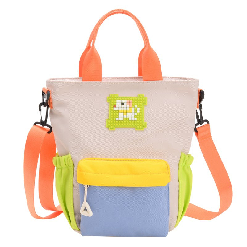 Mini handbag with colorful accents and practical carrying system