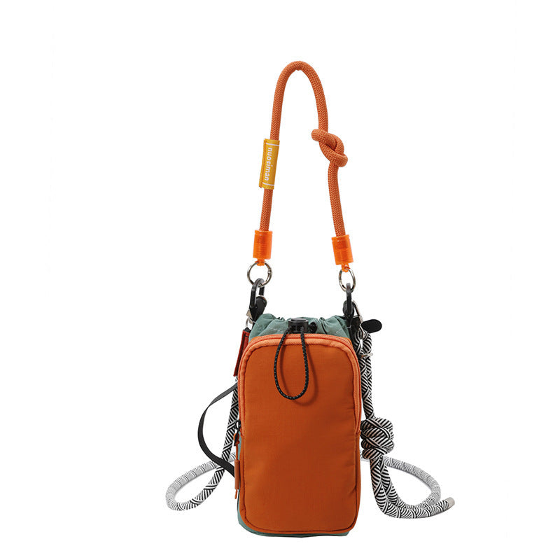 Women's multifunctional mini crossbody bag made of durable material with adjustable shoulder strap