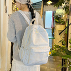 Cute backpack with embroidered cat motif