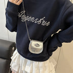 Women’s creative shoulder bag with unique magnetic closure