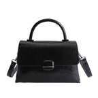 Women's handbag with textured design and elegant closure
