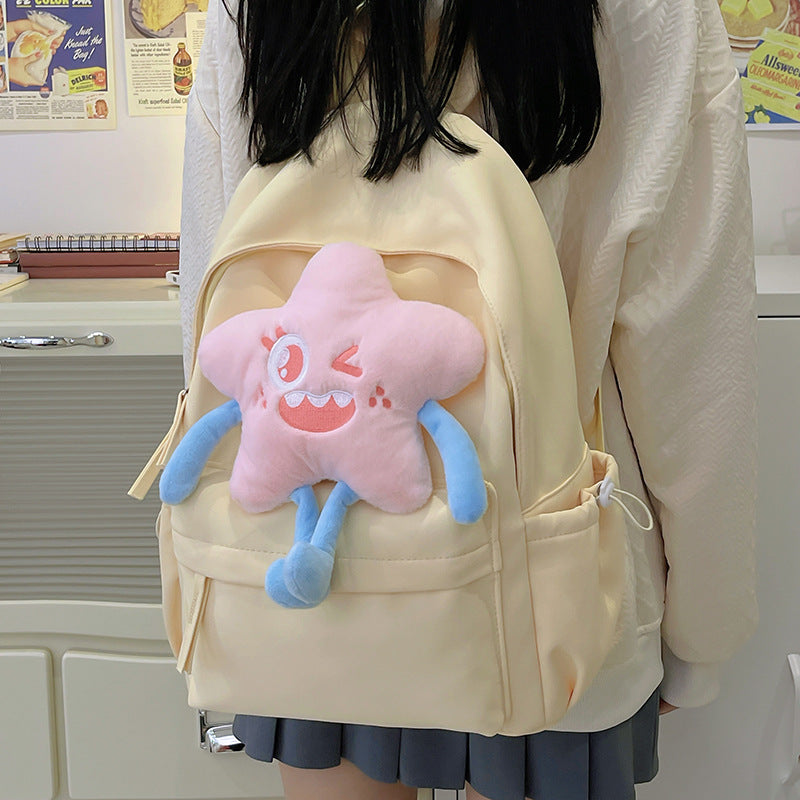 Plush backpack with playful star motif