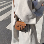 Women's mini handbag in modern, structured design