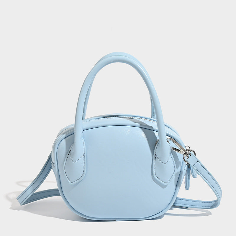Women's Mini Handbag with Luxurious Leather Accents