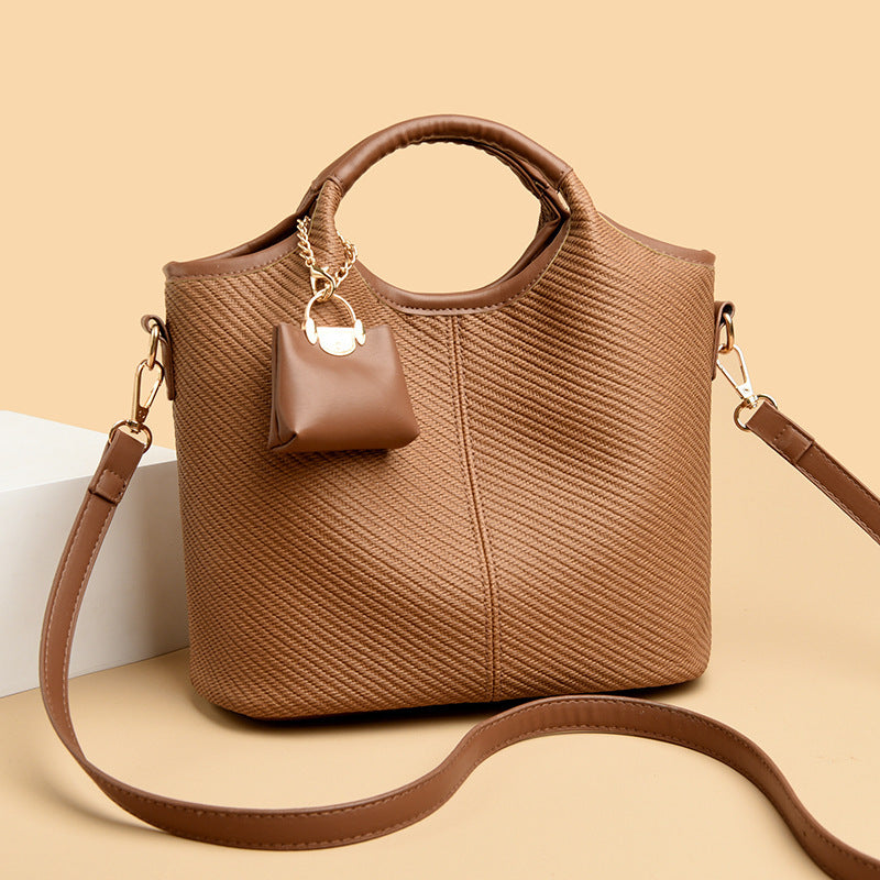 Ladies elegant handbag with textured design and removable mini organizer