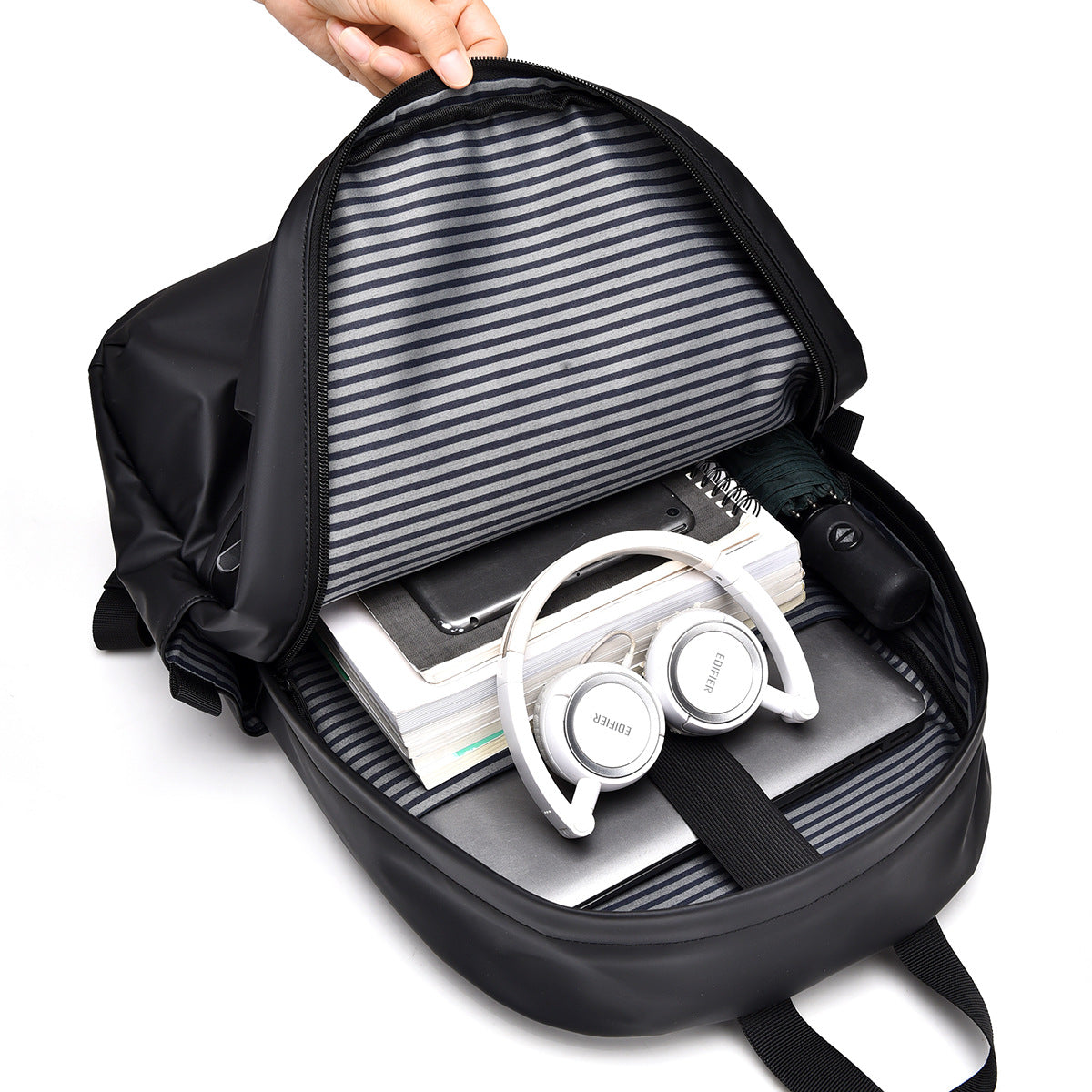 Practical backpack with water-repellent material and ergonomic design