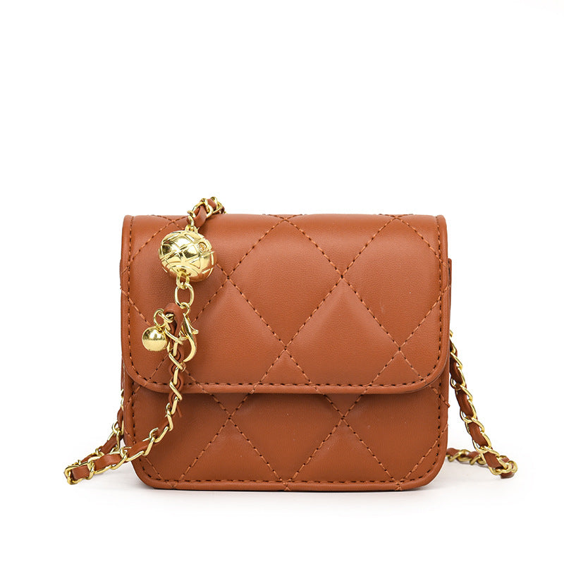 Ladies mini crossbody bag with shiny chain and charming pendant