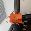 Women’s mini handbag with elegant bow decoration