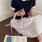 Women's mini handbag with decorative accents