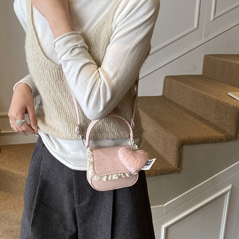 Women’s mini handbag with playful design and unique details