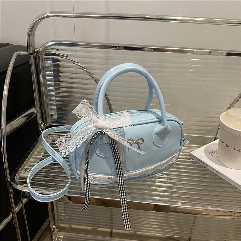 Elegant Lace-Trimmed Bow Handbag