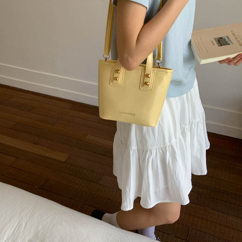 Ladies Mini-Handbag with elegant carry handle and practical inner compartment