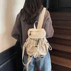 Leisure backpack with elastic drawstring and practical side pockets