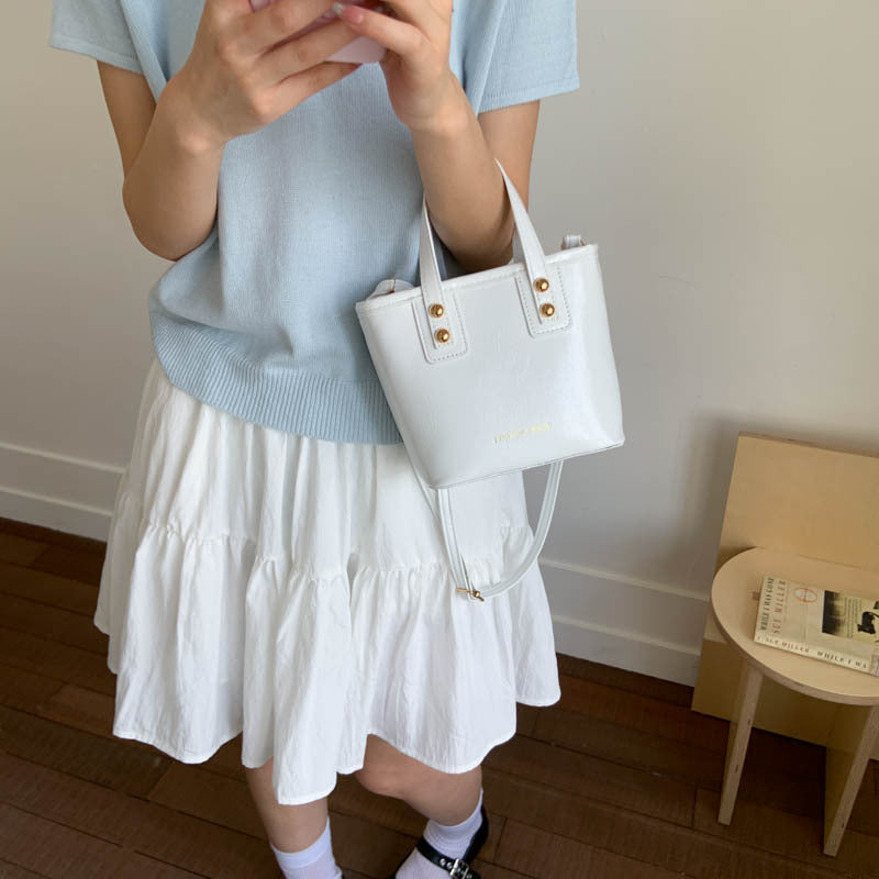 Women’s mini handbag with elegant chain closure