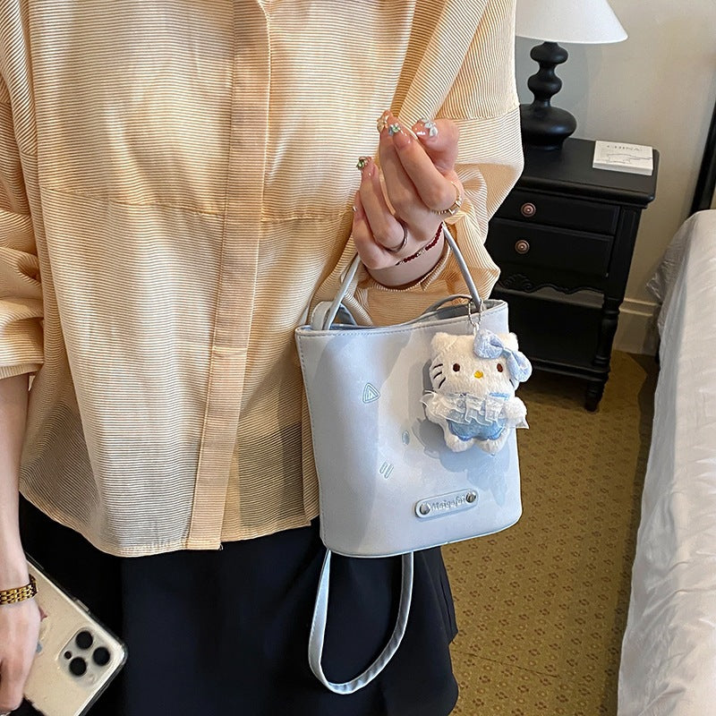 Women's mini bag with playful character