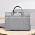 Laptop and briefcase in modern, minimalist design