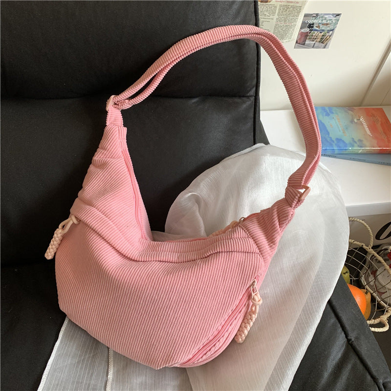 Shoulder bag with artistic fan design