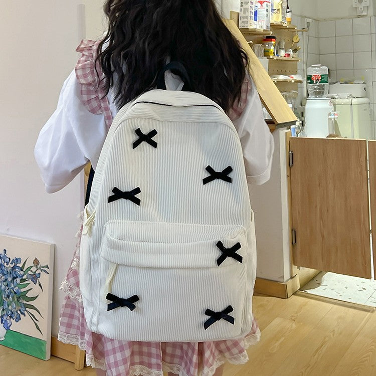 Backpack with Playful Ribbon Design