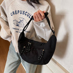 Practical shoulder bag with external zip pockets