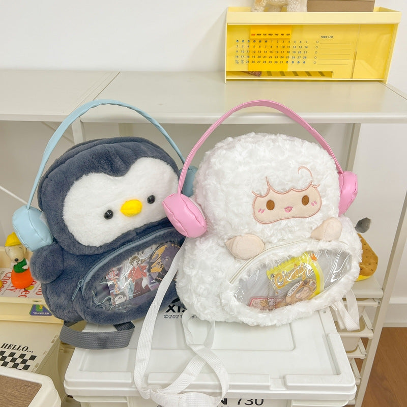 Plush backpack with transparent viewing window