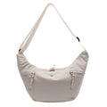 Practical shoulder bag with external zip pockets