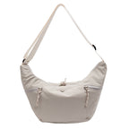 Practical shoulder bag with external zip pockets