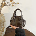 Women's mini handbag with glossy surface and fashionable zipper