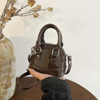 Women's mini handbag with glossy surface and fashionable zipper