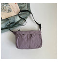 Fashionable shoulder bag with adjustable shoulder strap