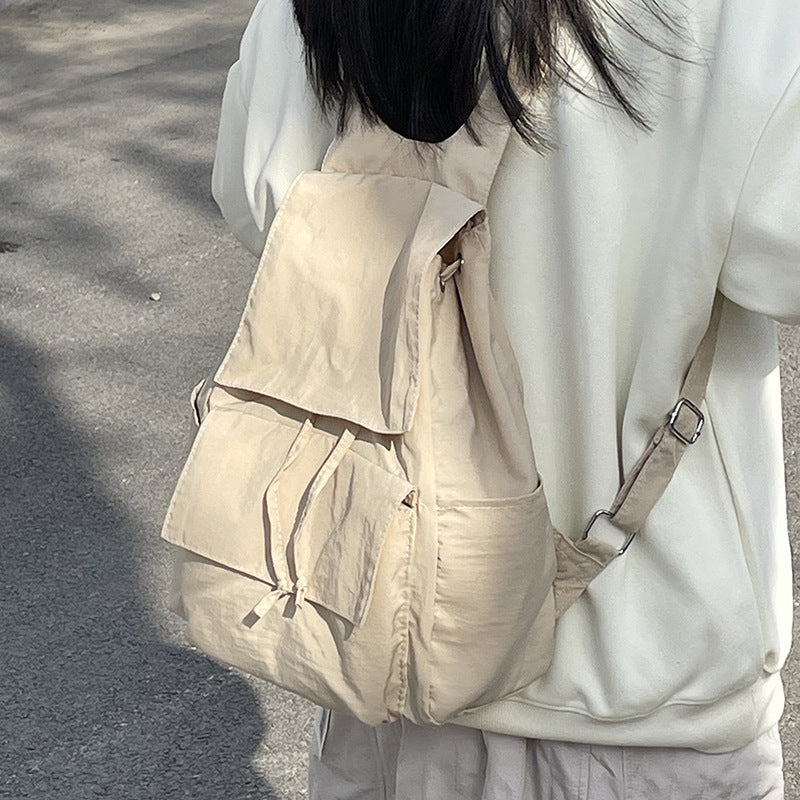 Versatile backpack with practical snap closure