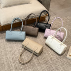 Ladies elegant handbag with minimalist silhouette