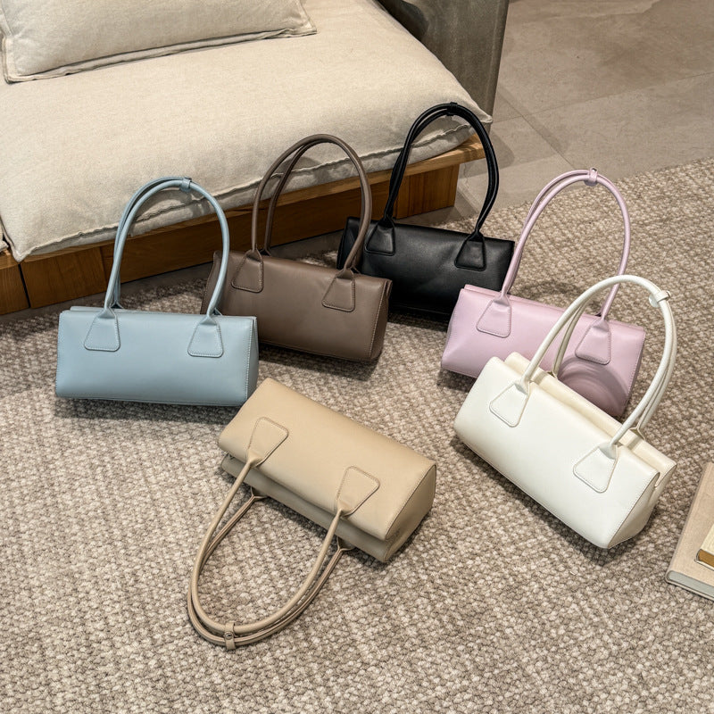 Ladies elegant handbag with minimalist silhouette