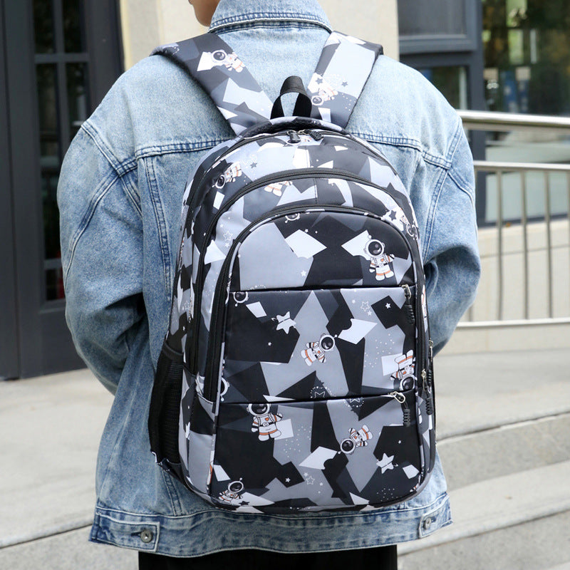 Fashionable school backpack with astronaut motif