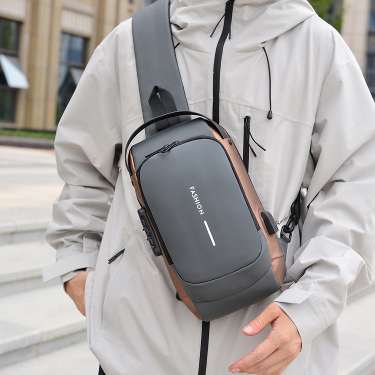 Shoulder bag with ergonomic design and multiple compartments