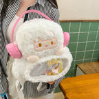 Plush backpack with transparent viewing window
