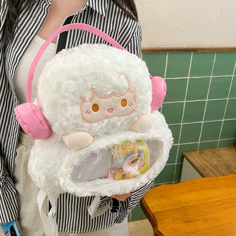 Plush backpack with transparent viewing window