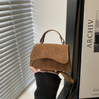 Women's mini handbag with removable carry handle